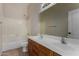 Bright bathroom featuring a double sink vanity, toilet, and tub with shower at 16846 N 49Th Way, Scottsdale, AZ 85254