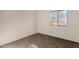 Bedroom with neutral walls, carpet flooring, and a window at 16846 N 49Th Way, Scottsdale, AZ 85254
