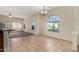 Open floor plan with tile floors, arched window and neutral paint tones create a relaxing ambiance at 16846 N 49Th Way, Scottsdale, AZ 85254