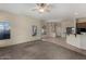 Spacious open living area with arched windows and transitions to the kitchen at 16846 N 49Th Way, Scottsdale, AZ 85254