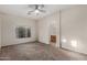 Comfortable primary bedroom with carpet floors and view to connecting bath at 16846 N 49Th Way, Scottsdale, AZ 85254