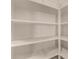 Spacious walk-in closet equipped with multiple shelves and wire rack storage at 16846 N 49Th Way, Scottsdale, AZ 85254