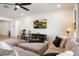 Living area featuring plush seating and media center at 17140 W Running Deer Trl, Surprise, AZ 85387