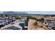 Aerial view featuring modern housing developments surrounded by natural desert landscape at 1879 W 23Rd Ave, Apache Junction, AZ 85120