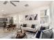Open-concept living room with neutral colors, modern furniture, and lots of natural light, ideal for entertaining at 1879 W 23Rd Ave, Apache Junction, AZ 85120