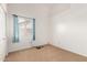 Cozy carpeted bedroom with natural light from the window with blue curtains at 18805 N 49Th Dr, Glendale, AZ 85308