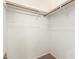 Walk-in closet with carpet flooring and built-in shelving at 18805 N 49Th Dr, Glendale, AZ 85308