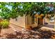 The home's exterior features stucco and a patio, plus attractive landscaping at 18805 N 49Th Dr, Glendale, AZ 85308
