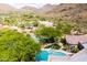 A picturesque view of a home's pool and sport court in a desert setting at 22020 N Church Rd, Scottsdale, AZ 85255