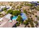Expansive property featuring a pool, tennis court, lush greenery, and desert landscaping for the ultimate outdoor oasis at 22020 N Church Rd, Scottsdale, AZ 85255