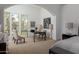 Bedroom sitting area with desk and a beautiful view of the pool at 22020 N Church Rd, Scottsdale, AZ 85255