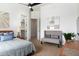 Bright bedroom featuring a cozy sitting area, walk-in closet, and neutral decor at 22020 N Church Rd, Scottsdale, AZ 85255