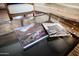 Close up of a coffee table featuring books about the Grand Canyon and Phoenix at 22020 N Church Rd, Scottsdale, AZ 85255