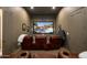 Cozy home theater featuring plush seating, a large screen, and a relaxed atmosphere at 22020 N Church Rd, Scottsdale, AZ 85255