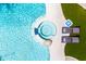 Overhead shot of a luxurious backyard hot tub and lounge chairs at 22020 N Church Rd, Scottsdale, AZ 85255