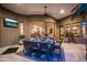Cozy outdoor dining area with a fully set table on a covered patio at 22020 N Church Rd, Scottsdale, AZ 85255