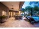 Outdoor patio with a fully equipped bar and outdoor lounge area by the pool at 22020 N Church Rd, Scottsdale, AZ 85255