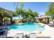 Beautiful backyard with pool, waterslide feature, mature desert landscape, and gazebo at 22020 N Church Rd, Scottsdale, AZ 85255