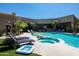 Backyard features sparkling pool, spa, lounge seating, and desert views at 22020 N Church Rd, Scottsdale, AZ 85255