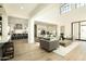 Spacious living room seamlessly connects to the kitchen and dining area, perfect for entertaining at 2315 E Mine Creek Rd, Phoenix, AZ 85024