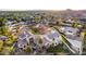 A community home boasts mountain views and a lush green backyard with a private pool at 2326 E Gardenia Dr, Phoenix, AZ 85020
