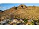 A view of this house in a desert community at 2326 E Gardenia Dr, Phoenix, AZ 85020