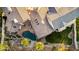 Custom backyard includes a private pool, a lush lawn, and gorgeous desert landscaping at 2326 E Gardenia Dr, Phoenix, AZ 85020