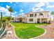 Well-maintained backyard features desert landscaping and a spacious lawn at 2326 E Gardenia Dr, Phoenix, AZ 85020