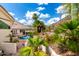 Inviting backyard featuring a pool, desert landscaping, and views of the surrounding mountain at 2326 E Gardenia Dr, Phoenix, AZ 85020