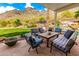 Cozy backyard patio with outdoor seating area and mountain views at 2326 E Gardenia Dr, Phoenix, AZ 85020