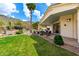 Cozy backyard patio with dining table and desert landscaping at 2326 E Gardenia Dr, Phoenix, AZ 85020