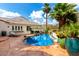 Sparkling pool surrounded by desert landscaping and patio seating area at 2326 E Gardenia Dr, Phoenix, AZ 85020