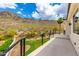 A serene balcony featuring desert landscaping and panoramic mountain views under a clear sky at 2326 E Gardenia Dr, Phoenix, AZ 85020