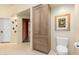 Bathroom with storage cabinet and toilet at 2326 E Gardenia Dr, Phoenix, AZ 85020