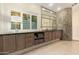 Bathroom with a large vanity featuring a stone countertop and tiled floors at 2326 E Gardenia Dr, Phoenix, AZ 85020