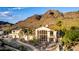 View of this home's eye-catching design, desert landscaping and mountain backdrop at 2326 E Gardenia Dr, Phoenix, AZ 85020