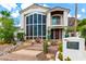 Elegant two-story home features a beautiful front yard, desert landscaping, and stylish architectural details at 2326 E Gardenia Dr, Phoenix, AZ 85020