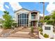 Elegant two-story home features a beautiful front yard, desert landscaping, and stylish architectural details at 2326 E Gardenia Dr, Phoenix, AZ 85020