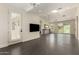 Spacious living room with hardwood floors and large windows showing outdoor views at 2326 E Gardenia Dr, Phoenix, AZ 85020