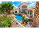 Backyard pool with desert landscaping and patio seating at 2326 E Gardenia Dr, Phoenix, AZ 85020