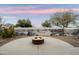 Beautiful backyard with a fire pit and mural for unique outdoor experience at 2487 S Conestoga Rd, Apache Junction, AZ 85119
