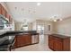 Beautiful kitchen featuring granite countertops, stainless steel appliances, and a convenient breakfast bar at 2487 S Conestoga Rd, Apache Junction, AZ 85119