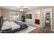 Beautifully decorated primary bedroom with stylish furnishings, ensuite bathroom, and walk-in closet at 2487 S Conestoga Rd, Apache Junction, AZ 85119