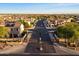 Long street view of community with well-maintained homes and landscaping at 2487 S Conestoga Rd, Apache Junction, AZ 85119