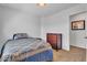 Bright bedroom offering a bed, dresser, and neutral tones for a peaceful and comfortable living space at 24886 W Huntington Dr, Buckeye, AZ 85326