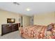 The main bedroom showcases a dresser, cozy carpet, and a serene atmosphere perfect for relaxation at 24886 W Huntington Dr, Buckeye, AZ 85326