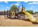 Well-equipped playground with slides and climbing structures, designed for interactive play at 24886 W Huntington Dr, Buckeye, AZ 85326