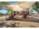 Shaded playground with slides and climbing structures, providing a fun and safe play area at 24886 W Huntington Dr, Buckeye, AZ 85326