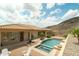 Enjoy the Arizona sunshine in this backyard with a pool, spa, and inviting lounge area for outdoor living at 2722 W Hiddenview Dr, Phoenix, AZ 85045