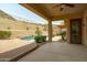 Expansive covered patio that overlooks the pool and desert landscape, perfect for outdoor living and entertaining at 2722 W Hiddenview Dr, Phoenix, AZ 85045